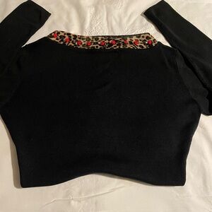 EUC-Joseph A. silk boat neck sweater with leopard trim and tiny roses.